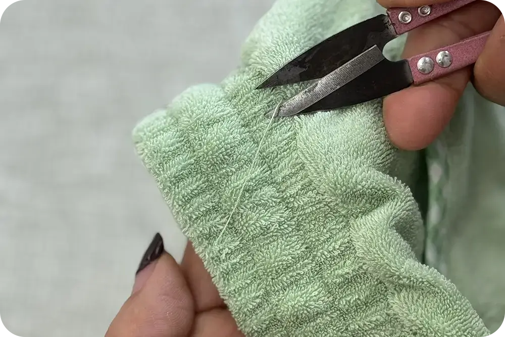 Quality control at Exfatter sewing station